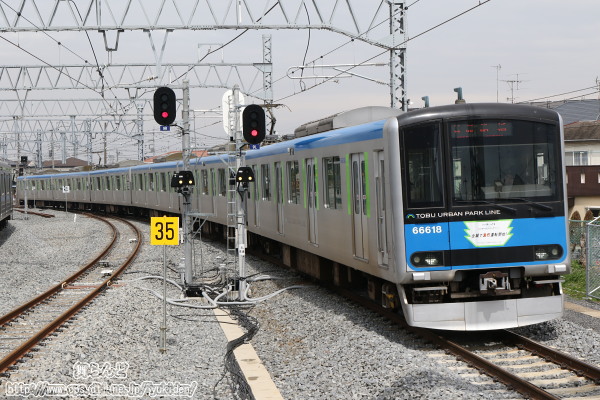 全線急行運転開始記念ヘッドマークを付けた61618F